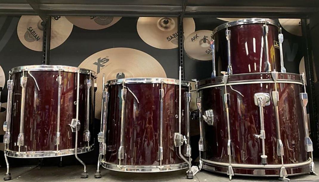 1990s Pearl Export kit in wine red before, stacked on a shelf